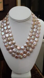 Three Strand Pink Coin Pearl Necklace. 